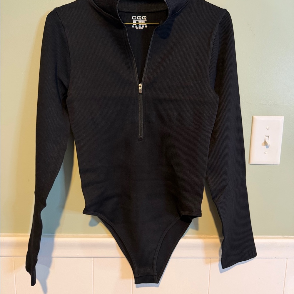 OQQ Black Ribbed Zip-Front One-Piece Bodysuit